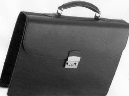 A ONE POCKET BRIEFCASE MADE OF LEATHER. WITH PIGSKIN LINING, A CARRYING HANDLE AND A LOCK. MEASUREMENTS ARE APPROX L420MM XH300MM XW80MM. BLACK  IN COLOUR