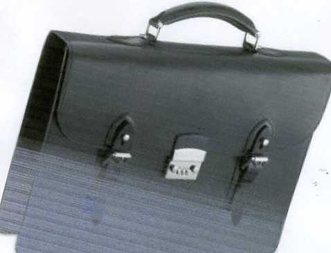 A ONE POCKET TWO BUCKLED BRIEFCASE MADE OF LEATHER WITH PIGSKIN LINING AND A CARRYING HANDLE AND A LOCK. MEASUREMENTS ARE APPROX L420MM XH370MM XW80MM. BROWN IN COLOUR
