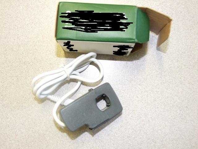 SENSOR TO FIT A WIRELESS ELECTRICITY MONITOR. THE SENSOR IS CLIPPED INTO THE FEED CABLE WHERE IT ENTERS THE ELECTRICITY METER. THE SENSOR IS CLIPPED AROUND THE CABLE AND THEN CONNECTED TO THE BATTERY POWERED WIRELESS TRANSMITTING UNIT. DATA COLLECTED IS THEN SENT TO A PORTABLE WIRELESS MONITOR UNIT WHICH HAS A FUNCTION THAT TRACKS ENERGY USAGE ON A DAILY, WEEKLY, AND MONTHLY BASIS TO SEE HOW CONSUMPTION IMPROVES OVER TIME, ENABLING ENERGY TO BE SAVED THROUGHOUT THE HOME.