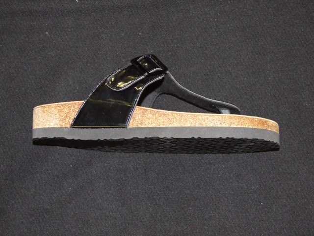 LADIES SANDAL. UPPERS OF PLASTIC. CONSISTING OF BUCKLE FASTENING STRAPS . WITH A PLASTIC TOE POST SEPARATING THE BIG AND FIRST TOE ASSEMBLED TO THE SOLE BY MEANS OF A PLUG. OUTER SOLES OF RUBBER. BLACK IN COLOUR.