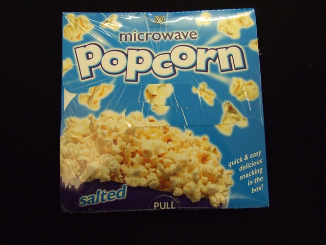 SALTED MICROWAVE POPCORN. PACKAGED IN A CARDBOARD CONTAINER, WRAPPED IN CELLOPHANE.