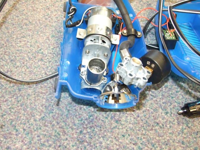 A MULTI-FUNCTIONAL COMPRESSOR WITH FLASH LIGHT/TORCH BEAM AND PRESSURE GAUGE. FOR THE INFLATING OF TYRES, DINGHIES AND SPORTS EQUIPMENT. POWERED BY CIGARETTE LIGHTER SOCKET. SUPPLIED COMPLETE WITH 12V DC CAR CIGARETTE LIGHTER PLUG ON 3M LONG (APPROX.) LEAD, TWO INFLATING ADAPTER NOZZLES, ONE NEEDLE VALVE ADAPTER AND HOSE CLIP-ON TYRE ADAPTER. MAX PRESSURE 17.93BARS. MAX FLOW RATE 0.78M3. PACKED IN A DISPLAY CARTON FOR RETAIL SALE.