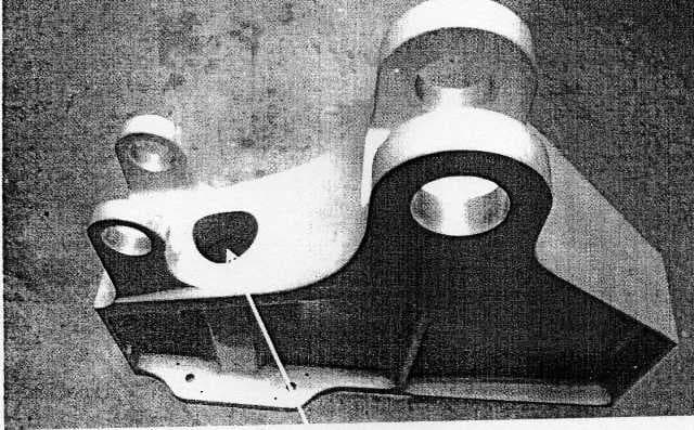 AIRCRAFT PARTS - SUPPORT BOX. PART FOR A CIVIL AIRCRAFT. MADE FROM ALUMINIUM ALLOY. SUPPORT BOX  IS POSITIONED IN THE WHEEL WELL IN EACH WING. THE LANDING GEAR DOORS HOOK AND LATCH INTO THE SUPPORT BOXES WHEN THE LANDING GEAR DOORS ARE CLOSED AND THE DOORS ARE CLOSED FOR FLIGHT. THE SUPPORT BOX CARRIES THE WEIGHT OF THE CLOSED LANDING GEAR DOOR DURING FLIGHT.