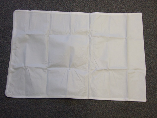 NON WOVEN PILLOW CASE OF POLYPROPYLENE TEXTILE WITH OUTER FILM OF NON CELLULAR POLYETHYLENE. WITH ZIP FASTENING. FOR USE IN HOSPITALS. ITEM MEASURES APPROXIMATELY 76CM X 50CM. PACKAGED IN PAIRS IN POLYTHENE BAGS, 50 PAIRS TO A CARDBOARD BOX. NOT FOR RETAIL SALE.