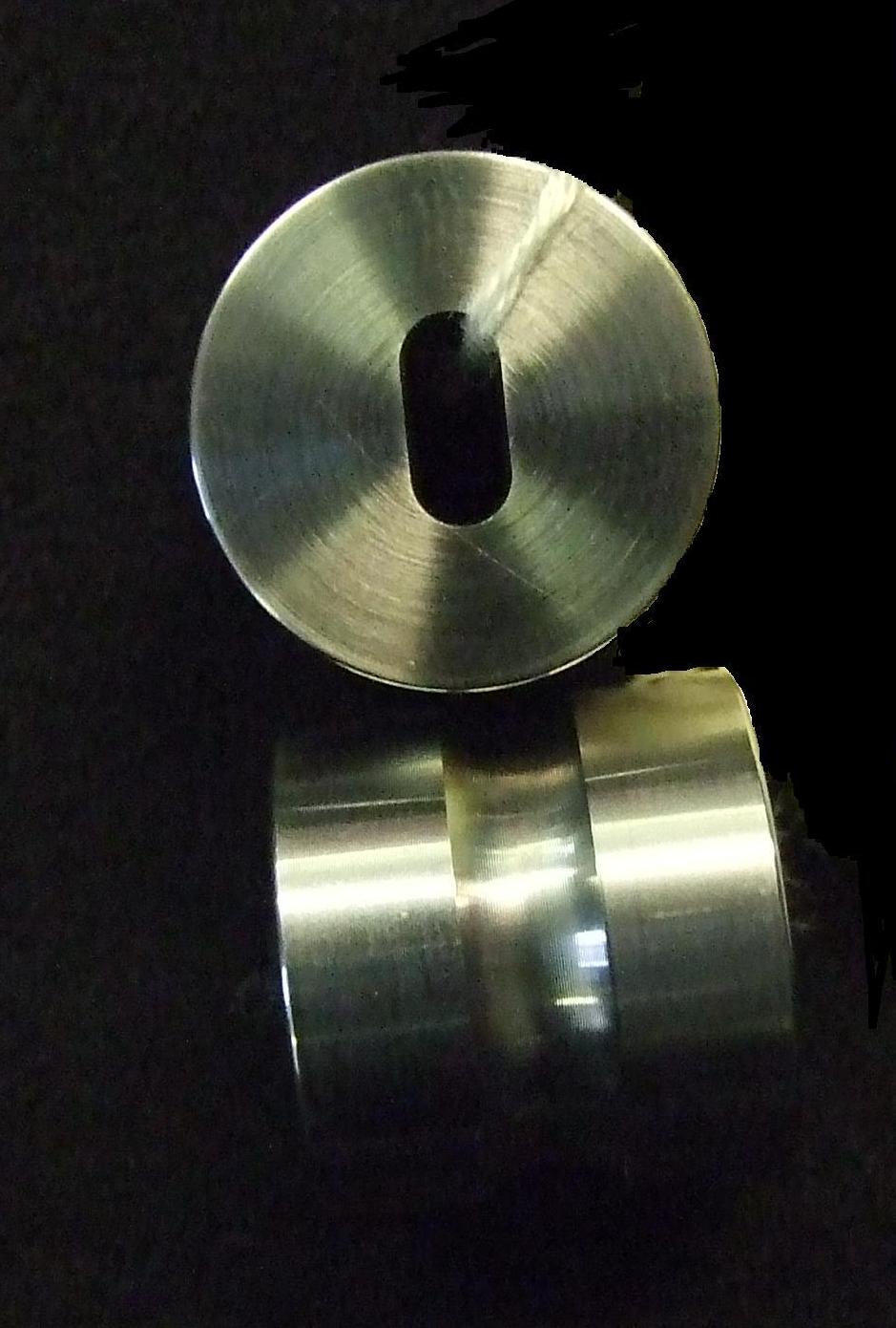 STEEL DIE. ALLOY STEEL SAWN AND PRECISION COLD FORMED INTO BASIC DIE SHAPE. THE HOLE WIRED IN THROUGH THE CENTRE IS MACHINED TO THE DIAMETER OF THE PUNCH TO WITHIN 2 MICRONS.  THE DIES ARE THEN CNC MACHINED AND PROFILE GROUND WITH A MIRRORED FINISH POLISH TO THE DIE BORE. THE DIE IS FOR USE IN THE COMPRESSION OF POWDER INTO TABLET FORM IN THE PHARMACEUTICAL, NUTRACEUTICAL AND CONFECTIONARY INDUSTRIES. PACKED INTO INDIVIDUAL PLASTIC TUBES AND THEN INTO TRI-WALLED CARDBOARD BOXES.