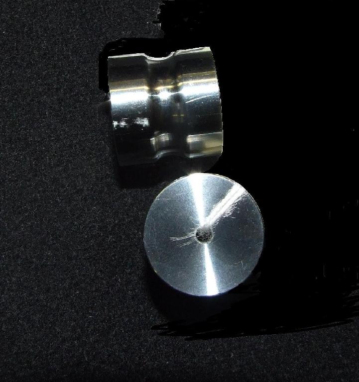 DIE BLANKS. ALLOY STEEL SAWN AND PRECISION COLD FORMED INTO BASIC DIE SHAPE. A SMALL HOLE IS WIRED IN THROUGH THE CENTRE. THE BLANKS ARE USED IN THE UK TO MANUFACTURE PRECISION SHAPED DIES FOR THE COMPRESSION OF POWDER INTO TABLET FORM IN THE PHARMACEUTICAL, NUTRACEUTICAL AND CONFECTIONARY INDUSTRIES.  PACKED INTO  CARDBOARD BOXES APPROX 25 PIECES PER BOX..