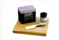 A STAINLESS STEEL CHEESE KNIFE PRESENTED AS PART OF A GIFT SET ALSO CONTAINING A BOX OF 75G SAVOURY BISCUITS, A WOODEN CHEESE BOARD AND ONE 35G JAR OF TOMATO AND GARLIC  CHUTNEY, WHICH ARE CLASSIFIED SEPARATELY. PRESENTED FOR RETAIL SALE IN A CARDBOARD AND PLASTIC BOX.