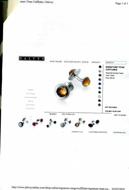 STAINLESS STEEL CUFF-LINKS WITH SWAROVSKI SMOKED TOPAZ GLASS STONE. PACKAGED IN A PLASTIC AND PAPER GIFT BOX.
