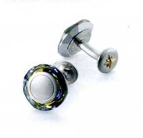 A PAIR OF CUFFLINKS. OF STAINLESS STEEL WITH A SAHARA STONE AT THE RIM. WITH NINE CARAT GOLD STAR SHAPE CENTRE ON THE BOTTOM PART OF THE CUFFLINKS. PACKAGED FOR RETAIL SALE IN A PLASTIC AND PAPER GIFT BOX.