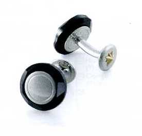 A PAIR OF CUFFLINKS. OF STAINLESS STEEL WITH BLACK JET STONE AT THE RIM. WITH NINE CARAT GOLD STAR SHAPE CENTRE ON THE BOTTOM PART OF THE CUFFLINKS. PACKAGED FOR RETAIL SALE IN A PLASTIC AND PAPER GIFT BOX.
