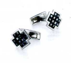 A PAIR OF CUFFLINKS. OF STAINLESS STEEL WITH 12 JET HEMATITE FACETED GLASS CRYSTALS. CROSS SHAPED. PACKAGED FOR RETAIL SALE IN A PLASTIC AND PAPER GIFT BOX.