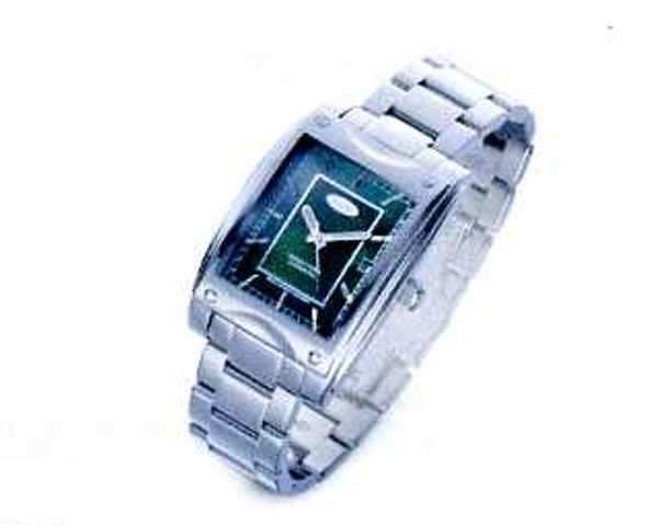 WRIST WATCH WITH GREEN DIAL AND STAINLESS STEEL STRAP. 25 JEWEL SWISS MADE AUTOMATIC MOVEMENT. DIAL SIZE 30.5MM HIGH X 24MM WIDE. PACKED IN A PLASTIC AND PAPER GIFT BOX.