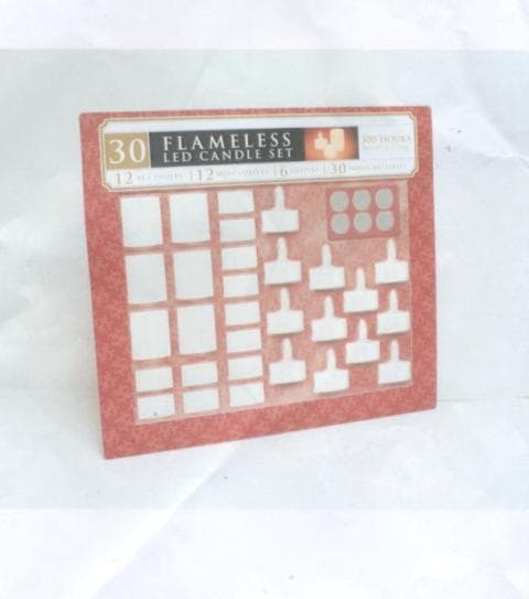 30 PIECE FLAMELESS TEA LIGHT SET. WAX COATED. UNSCENTED. MADE OF PLASTIC. RUN ON CR2032 BATTERIES. THE SET CONSISTS OF 12 TEA LIGHTS, 12 MINI VOTIVES AND 6 VOTIVES WITH 30 BATTERIES. PACKAGED FOR RETAIL SALE.
