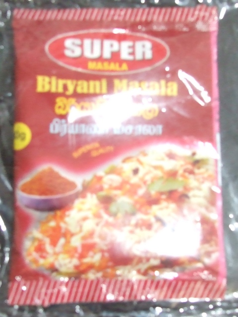 BIRYANI MASALA: A BLEND OF SPICES MIXED AND POWDERED. THE MIXTURE IS: FENNEL, DRY GINGER, GARLIC, TOMATO, MINT, STARNISE, CINNAMON, CHILLI, ONION, CARDAMOM, CLOVES, MACE, BRINI LEAVES CASHEW.