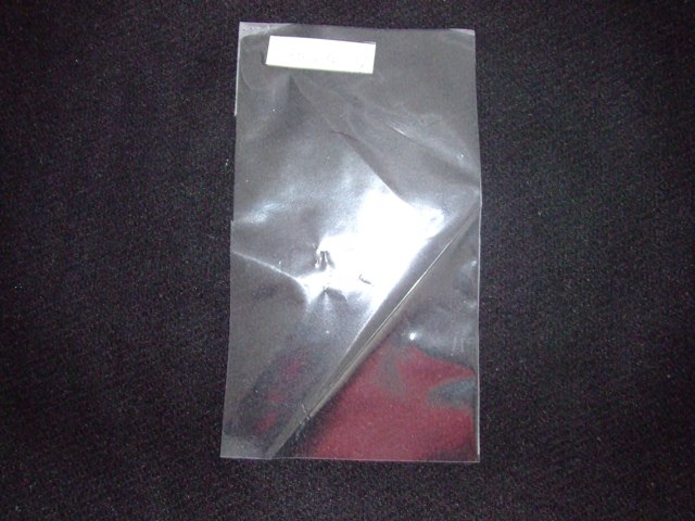 A HIGH DENSITY POLYESTER BASED NON FORMING FILM COMPRISING 81 PER CENT POLYETHYLENE (PE) AND 19 PER CENT ORIENTED POLYETHYLENE TEREPHTHALATE (OPET).THICKNESS IS 63.5 MICRONS IN TOTAL AND GRAVITY IS 1.005  GMS PER CUBIC CENTIMETRE. THE FILM IS USED FOR SEALING TO COATED PAPERS. COMPATIBLE WITH ELECTRON BEAM AND GAMMA RADIATION. PRIMARILY USED IN POUCH APPLICATIONS.