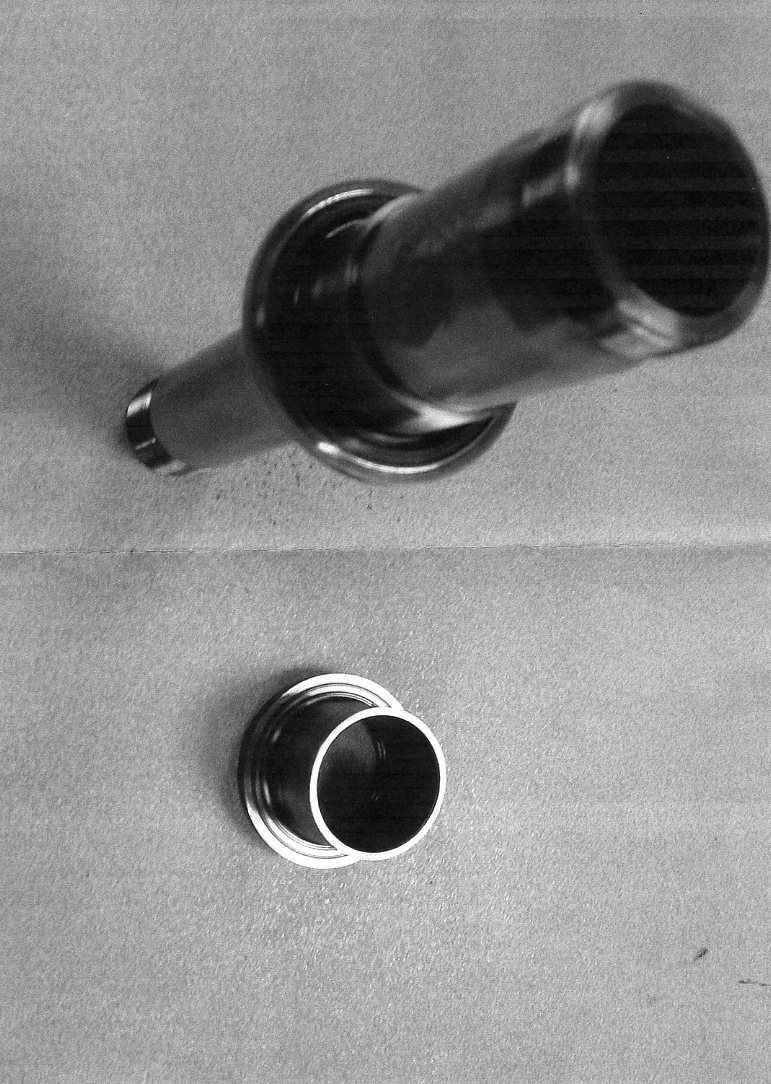 MACHINED STEEL COMPONENT USED IN A FUEL PUMP.