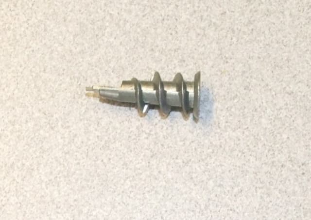 A DRYWALL AND PLASTER BOARD FIXING BEING A SELF DRILLING PLUG WITH FLAT WASHER HEAD TO PREVENT DRILLING THROUGH THE BOARD AND GIVE A FLUSH FIXING.