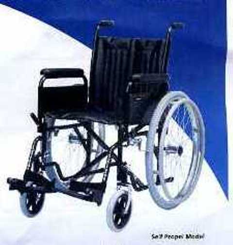 WHEELCHAIR WITH STEEL FRAME, QUICK RELEASE FOOT PLATES AND PUNCTURE PROOF FRONT WHEELS. IT HAS VINYL SEAT AND LEATHER BACK. WHEEL CHAIR CAN BE PROPELLED BY EITHER A WHEELCHAIR OCCUPANT OR CARER