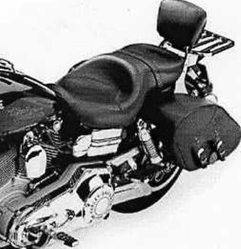 MOTORCYCLE SADDLE. OF LEATHER. FEATURING A DEEP CONTOURED BUCKET SEAT THAT PROVIDES THE RIDER WITH LOWER BACK SUPPORT.