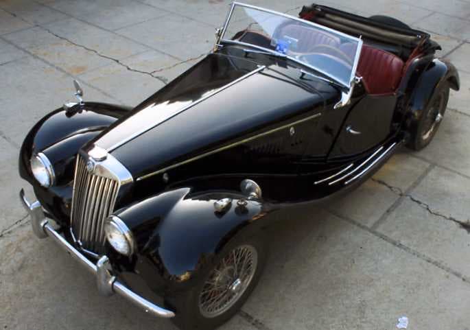 A 1954 MGTF MOTOR CAR. CHASSIS: HDA46/2280. ENGINE NUMBER XPAG/TF/32015. BLACK IN COLOUR WITH BURGUNDY HIDE TRIM. LEFT HAND DRIVE. $23,000 IN COST. BOUGHT FROM A PRIVATE SELLER. ONE OWNER FROM NEW. ALL IN ORGINAL CONDITION. TWO DOOR, TWO SEATER. WILL BE USED FOR SHOW AND EVENTS.