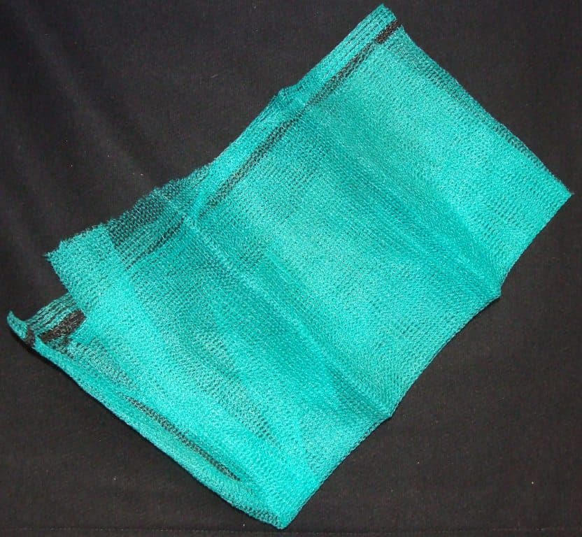 A WARP KNITTED NETTING FABRIC MADE FROM MONOFILAMENT POLYETHYLENE YARN(DEBRIS NETTING). WITH ROWS OF TEXTILE EYELETS ALONG THE EDGES AND THE CENTRE OF THE FABRIC, WHICH ARE PRODUCED DURING THE MANUFACTURE OF THE FABRIC.  DYED GREEN. WIDTH 2 X LENGTH 50M.