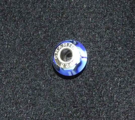 MURANO GLASS BEAD BEAD WITH A STERLING SILVER INSERT. THE THREADING HOLE  IN THE BEAD IS LINED WITH STERLING SILVER, THIS IS CALLED THE INSERT. THE BEAD  IS DESIGNED TO BE THREADED ONTO A FLEXIBLE BRACELET ALONG WITH OTHER SIMILAR BEADS OR CHARMS IN COLOURS OR DESIGNS OF THE WEARERS CHOICE. DIMENSIONS,  APPROXIMATELY 14MM IN DIAMETER.
