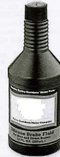A 12 OZ BOTTLE OF SILICONE BRAKE FLUID.  IT IS IN THE FORM OF A PURPLE LIQUID WITH A SLIGHT ODOR AND IS BASED ON TRIBUTYL PHOSPHATE AND DIMETHYL CYCLOSILIOXANES.