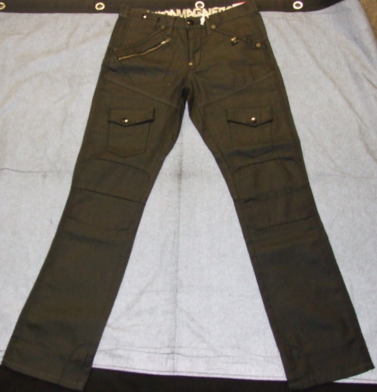 WOVEN DENIM TROUSERS FOR MEN. REACHING DOWN FROM THE WAIST TO THE ANKLES. WITH LEFT OVER RIGHT FASTENING BY ZIP AND BUTTON AT WAIST.  WITH VARIOUS POCKETS AT HIP AND THIGH.  HEMMED AT LEG ENDS.   100% COTTON. SAID TO HAVE A PU COATING, WHICH IS NOT CONSIDERED VISIBLE TO THE NAKED EYE.