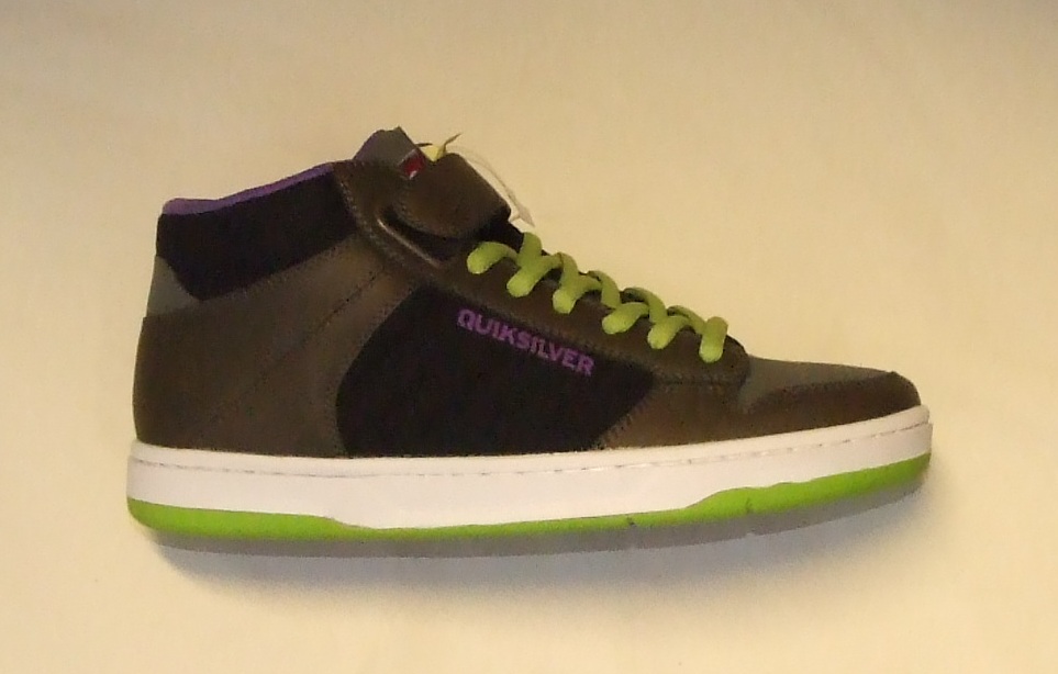 A UNISEX SKATEBOARDING SHOE COVERING THE ANKLE BUT NO PART OF THE CALF. UPPERS OF LEATHER (SUEDE) AND TEXTILE WHERE THE LEATHER PREDOMINATES.  OUTER SOLE OF FLEXIBLE RUBBER WITH A SNOWCAP PATTERN. REMOVABLE VELCRO STRAP SPECIAL TECHNOLOGY IN THE FORM OF A. REMOVABLE IN-SOLE WITH A HYPERSTRETCH GEL PAD. IN-SOLE LENGTH EXCEEDS 24 CMS. TONGUE AND SIDE OF SHOE HAS LOGO.LIME GREEN LACE-UPS.CIF PRICE EXCEEDS 7.5 EUROS. FOAM PADDED TONGUE AND COLLAR FOR ANKLE PROTECTION. BROWN, BLACK AND LIME IN COLOUR.