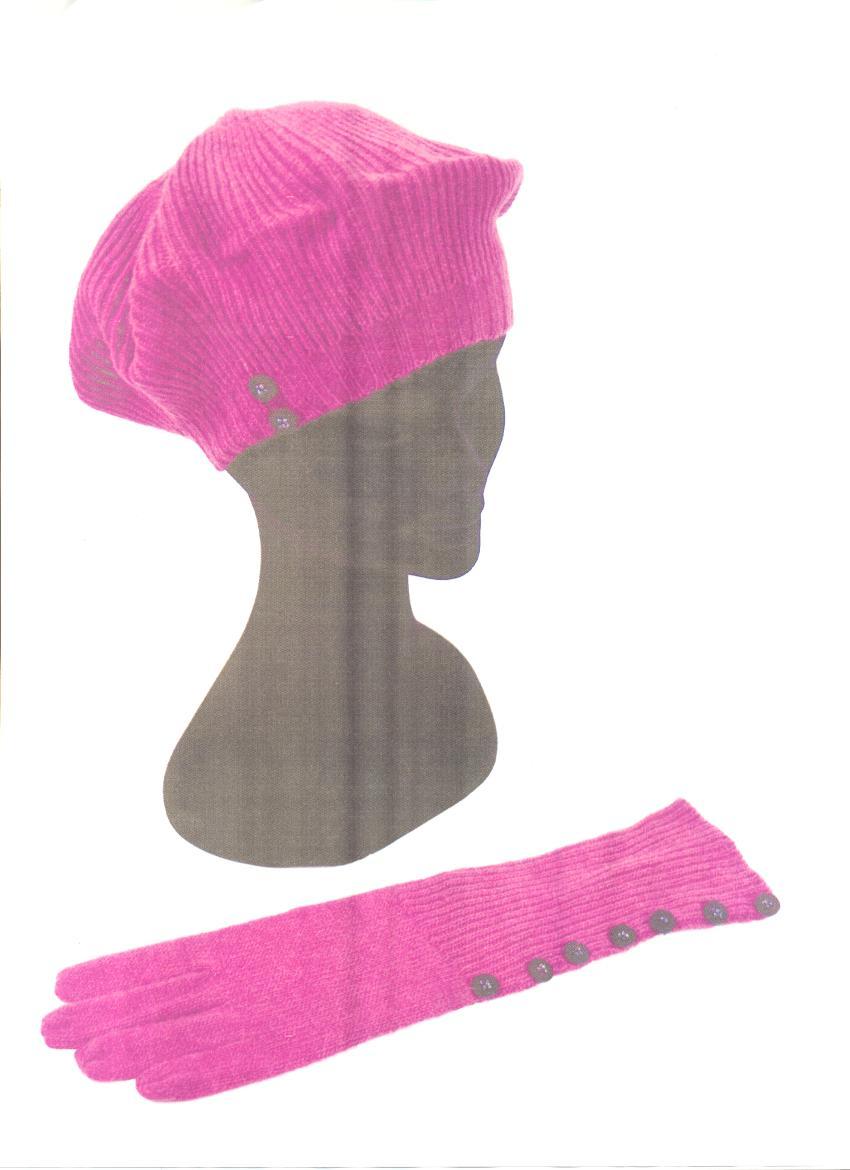 A KNITTED WOOL BERET WITH BUTTONS. MADE OF 70% WOOL, 20% ANGORA AND 10% NYLON. DIAMETER 27CM.