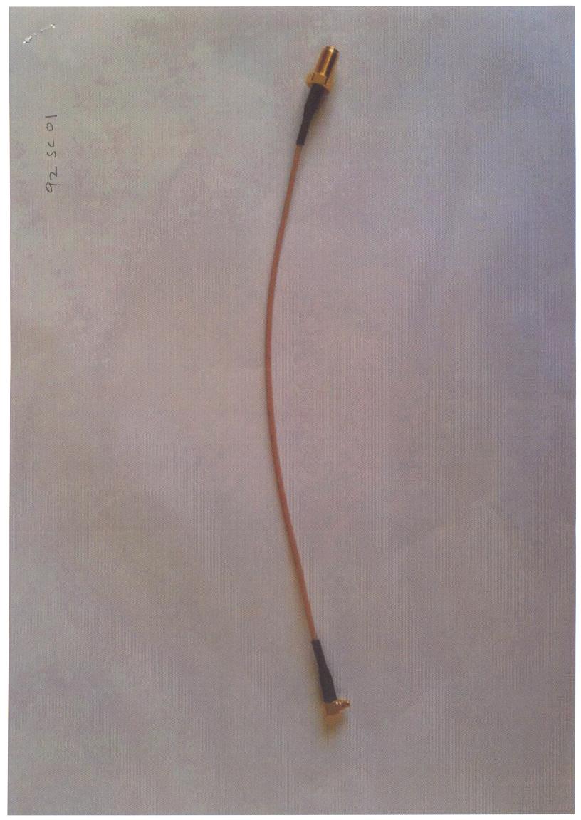 A CO-AXIAL CABLE. 16 CENTIMETERS IN LENGTH, FITTED WITH A GOLD 50 OHM BULKHEAD MMCX CONNECTOR AT ONE END AND A SMA CONNECTOR AT THE OTHER END. OF A VOLTAGE OF LESS THAN 80 VOLTS . CUSTOM MADE FOR USE IN COMPUTERS.