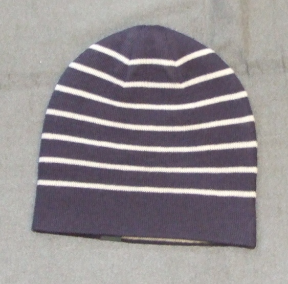 KNITTED BEANIE STYLE HAT. MADE OF 50% WOOL AND 50% ACRYLIC. FULLY REVERSIBLE. COLOUR CHOICES ARE PLAIN LIGHT GREY OR NAVY BLUE WITH 7 LIGHT GREY STRIPES CIRCLING THE HAT. PRESENTED WITH A DISPOSABLE PLASTIC HOOK AND SWING TICKET.