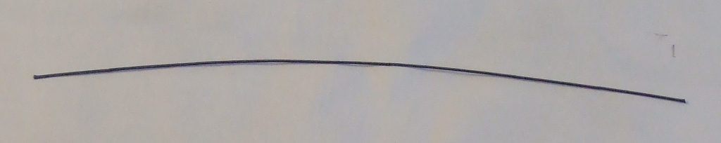 FIXED CARBON COMPOSTION RESISTOR.IGNITION CABLE SUPPRESSED CONDUCTOR.ARAMID FIBRE/CARBON SUPPRESSION CONDUCTOR WITH RELEASE.CARRIER THREE ENDS OF 1500 DENIER ARAMID FIBRE.GRAPHITE COATING, SIX COATS OF CARBON LOADED CONDUCTIVE GRAPHITE INDIVIDUALLY CURED. RELEASE AGENT, TWO COATS OF GRAPHITE/CARBON.FINISHED RESISTANCE, 2,500 TO 3,800 OHMS PER FOOT (8,100 TO 12,400 OHMS/METER). FINISHED DIAMETER 046" +/-.004" (1.15MM +/-.1MM)..PACKAGING ON WOOD REEL.