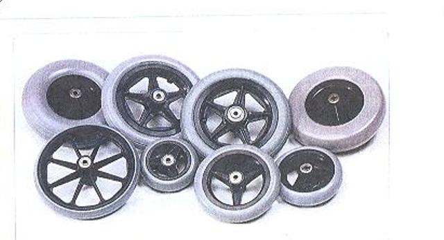 WHEELCHAIR CASTORS. 100 PERCENT NON MARKING. FIITED WITH 2 X 8MM BEARINGS AND A SPACER TO PREVENT THE BEARING BEING CRUSHED.