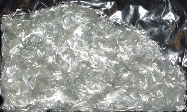 CHOPPED FIBREGLASS STRANDS OF A LENGTH OF 3MM TO 6MM.THE CHOPPED STRANDS OF FIBREGLASS ARE SET WITH PLASTIC THERMOSET BULK MOULDING COMPOUND.