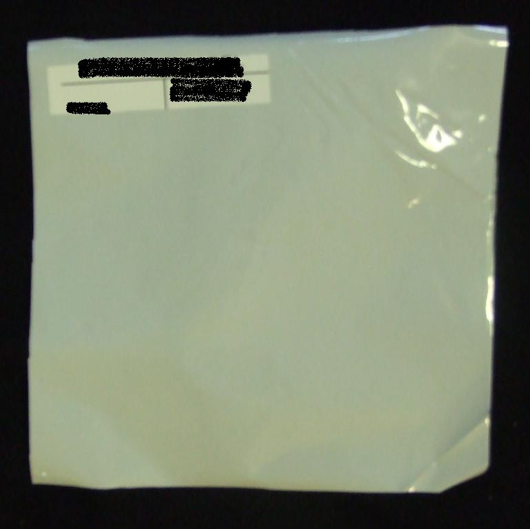 FILM CONSTRUCTED OF ORIENTED POLYESTER (POLYETHYLENE TEREPHTHALTE),  ADHESIVE AND WHITE SEALANT. 0.065MM THICK. USED IN MEDICAL DEVICE LIDDING AND POUCH APPLICATIONS ON HORIZONTAL FORM, FILL AND SEAL MACHINES AS WELL AS PLATEN AND ROTARY STYLE POUCH MACHINES.