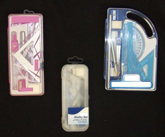 A MATHS SET CONTAINING TWO SET SQUARES, A 180° PROTRACTOR, A 15 CM RULER, A COMPASS, A PENCIL, AN ERASER AND A PENCIL SHARPENER.  PACKAGED AS A SET FOR RETAIL SALE IN A PLASTIC CASE.  AVAILABLE IN THE FOLLOWING COLOUR WAYS: PINK AND TRANSPARENT, BLUE AND TRANSPARENT, AND BLACK AND TRANSPARENT.
