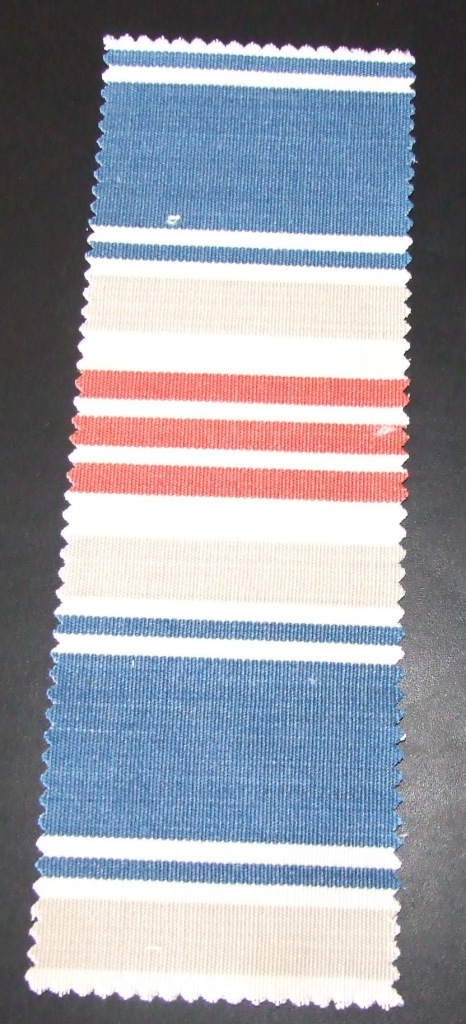 A WOVEN FABRIC MADE FROM 100% COTTON.  HORIZONTAL DESIGN REPEAT = 12.4 CMM.  THE FABRIC WIDTH IS 140 CM, WEIGHT IS 368 G/M2 AND IS MADE FROM YARNS OF DIFFERENT COLOURS.