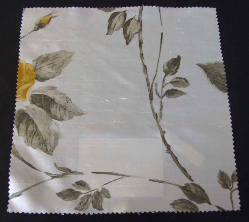 A WOVEN FABRIC MADE FROM 100% DYED SILK WITH PRINTED FLOWER AND LEAF DESIGN.  VERTICAL DESIGN REPEAT = 673 CM AND HORIZONTAL DESIGN REPEAT = 688 CM.  THE FABRIC HAS A WIDTH OF 142 CMS AND A WEIGHT OF 75 G/M2.  IT HAS BEEN MADE ON A POWER LOOM.