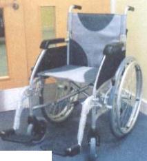AN ULTRA LIGHTWEIGHT ALUMINIUM WHEELCHAIR.  SELF PROPEL MODEL FEATURES LARGE BACK WHEELS WITH RIMS WHICH CAN BE MOVED BY THE USER; TRANSIT MODEL HAS SMALL BACK WHEELS AND BRAKES ON THE HANDLES.  FEATURES:
THE ULTRA LIGHTWEIGHT ALUMINIUM CHAIR WAS DEVELOPED TO INCLUDE ALL THE FEATURES OF THE LAW RANGE WITH AN ADDITIONAL FOCUS ON DESIGN. 
- SILVER ALUMINIUM FRAME WITH A SINGLE CROSS BRACE.
- GREY TWO TONE UPHOLSTERY WITH REAR POCKET.
- SWING OUT QUICK RELEASE FOOTRESTS WITH HEIGHT ADJUSTMENT
- HALF FOLDING BACK MECHANISM
- DESK STYLE ARMRESTS WITH FABRIC SIDE PANELS AND POCKET.
- TWO STEPPER TUBES
- QUICK RELEASE 24" SOLID GREY PU TYRES, ALUMINIUM RIMS AND HAND RIMS.
- PLASTIC FRONT FORKS WITH 20CM (8") X 3.2CM (1") GREY PU TYRES.
SELF PROPEL MODEL:
- LONG REACH BRAKES.
- SPOKED REAR WHEELS
TRANSIT MODEL:
- CRANKED PUSH HANDLES FOR COMPACT FOLDING.
- LONG REACH BRAKES AND REAR CABLE BREAKS.
SPECIFICATIONS:
  SELF PROPEL MODEL -	
	WIDTH (OPEN): 62CM (24")
	WIDTH (CLOSED): 32CM (13")
	LENGTH: 107CM (42")
	HEIGHT: 93CM (36.5")
	SEAT WIDTH: 42CM (17")
	SEAT LENGTH: 39CM (16")
	SEAT HEIGHT: 52CM (20.5")
	WEIGHT	: 13KG (29LB)
	WEIGHT CAPACITY: 115KG (18ST)
  TRANSIT MODEL -
	WIDTH (OPEN): 61CM (24")
	WIDTH (CLOSED): 28CM (11")
	LENGTH: 95CM (38")
	HEIGHT: 97CM (36")
	SEAT WIDTH: 42CM (17")
	SEAT LENGTH: 39CM (16")
	SEAT HEIGHT: 52CM (20.5")
	WEIGHT	: 12KG (26LB)
	WEIGHT CAPACITY: 115KG (18ST)