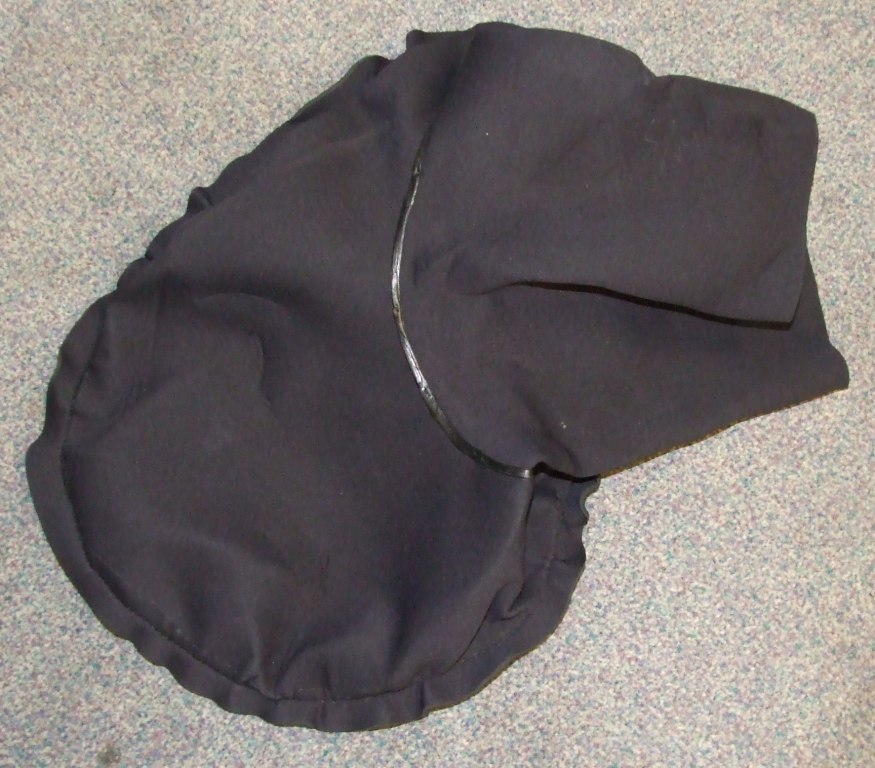 SPRAY DECK MADE FROM NEOPRENE COVERED WITH A TEXTILE MATERIAL ON BOTH FACES USED TO KEEP THE WATER OUT OF A KAYAK.
THE SPRAY DECK IS PLACED AROUND THEWAIST AND AROUND THE KAYAK  OPENING  TO PREVENT WATER ENTERING THE KAYAK. IT IS SPECIFICALLY SHAPED TO GO ROUND A KATAK ENTRANCE. BLACK IN COLOUR WITH LOGO.