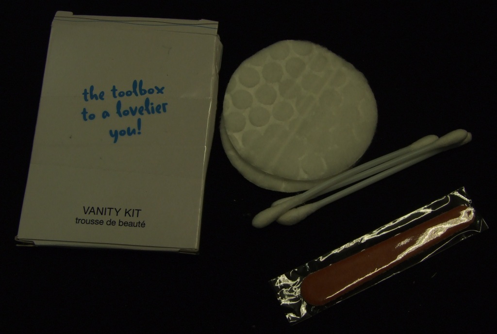ABSORBENT PADS AND BUDS. DISPOSABLE ARTICLES OF COTTON WADDING. DESIGNED FOR ONE OFF USE. CONSISTING OF 2 SMALL CIRCULAR PADS AND ALSO 2 COTTON BUDS EACH DOUBLE ENDED ON A PLASTIC STICK. PACKAGED WITH A SMALL CARBOARD STRIP COVERED WITH ABRASIVE MATERIAL ON ONE SIDE FOR USE AS A NAIL FILE. PRESENTED IN A CLEAR PLASTIC BAG INSIDE A PRINTED CARDBOARD BOX.