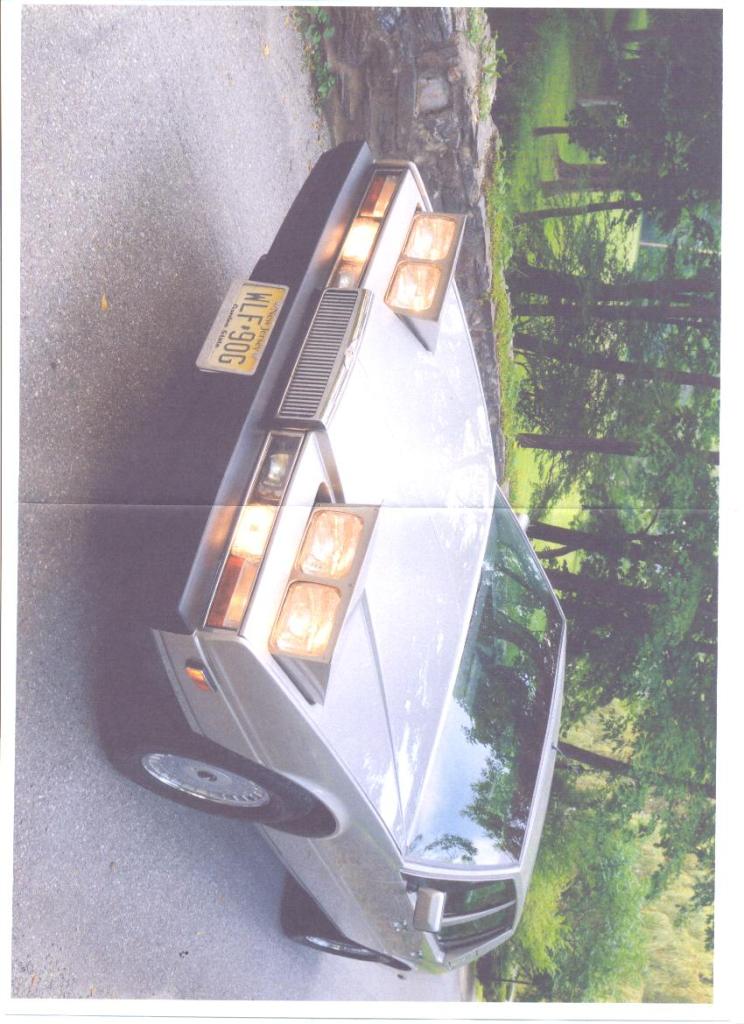 1985 ASTON MARTIN LAGONDA, SERIES 2, SALOON. 4 DOORS. L/HAND DRIVE. TRANSMISSION: AUTOMATIC TRANSMISSION. ENGINE: 5,340CC, V8, PETROL ENGINE. BODY COLOUR: SILVER (CONISTON SAND). INTERIOR: BLUE & GREY.