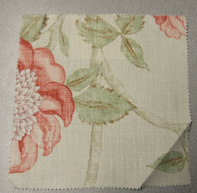 WOVEN FABRIC OF LINEN WITH PRINTED FLORAL DESIGN. WEIGHING 387 GRAMS PER METRE SQUARED. WIDTH 135 CM.