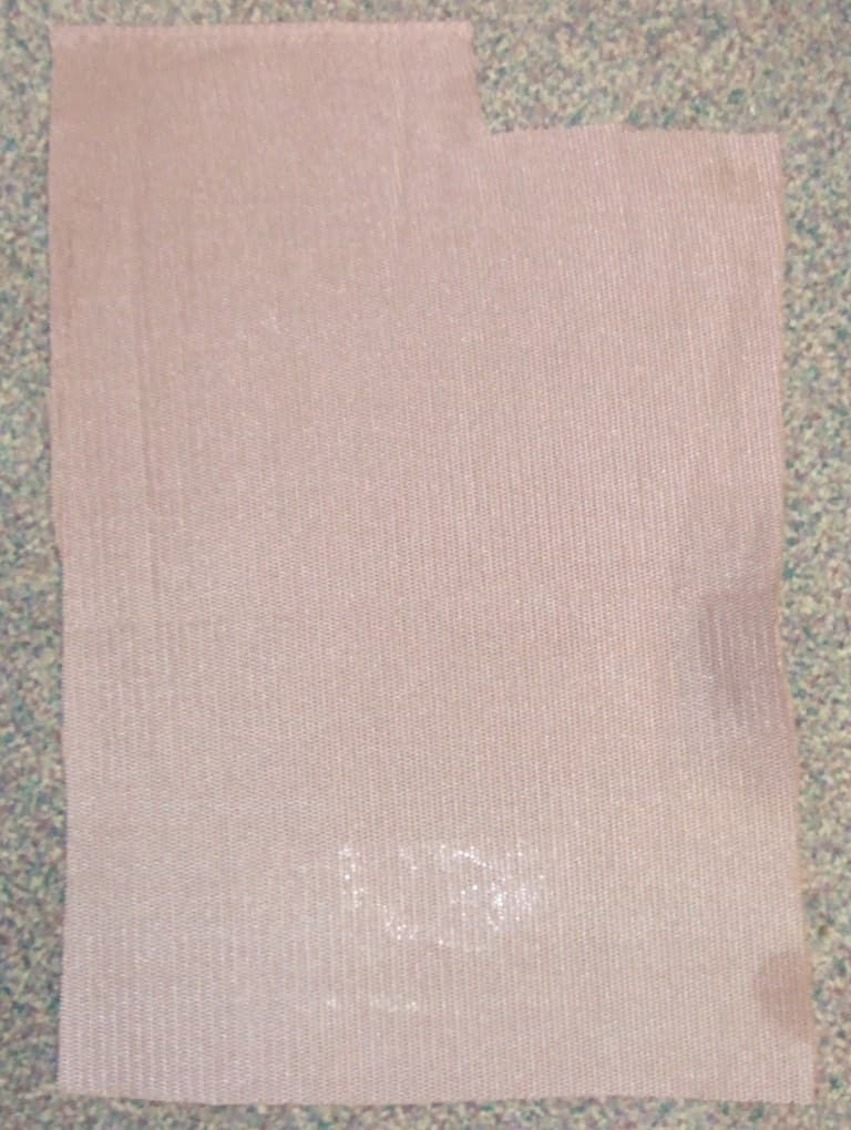 WEFT KNIT FABRIC OF 100% POLYESTER PRODUCED IN A SINGLE PROCESS. HAVING THE APPEARANCE OF TWO LAYERS OF KNITTED FABRIC HELD TOGETHER BY LOOPED TEXTILE YARNS. MEASURES APPROXIMATELY 3MM IN THICKNESS.