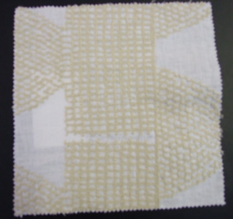A PLAIN WEAVE, PIECE DYED, LINEN, COTTON AND POLYESTER EMBROIDERED FABRIC.  IT HAS A VISIBLE BACKGROUND.  OVERALL COMPOSITION IS 55% LINEN, 38% COTTON AND 7% POLYESTER.  VERTICLE REPEAT DESIGN IS 32CM AND HORIZONTAL REPEAT IS 16CM.  THE FABRIC HAS A WIDTH OF 150CM AND GRAMS PER M2 IS 465.  THE FABRIC IS MADE ON A POWER LOOM.  VALUE EXCEEDS 17.5 EUROS PER KG.