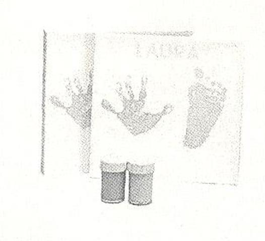 UNISEX CANVAS KIT. CONSISTS OF A CANVAS AND TWO POTS OF PAINT. (PINK AND BLUE). THE PAINT IS USED FOR A CHILD TO MAKE A PRINT OF THEIR HANDS OR FEET ON THE CANVAS.