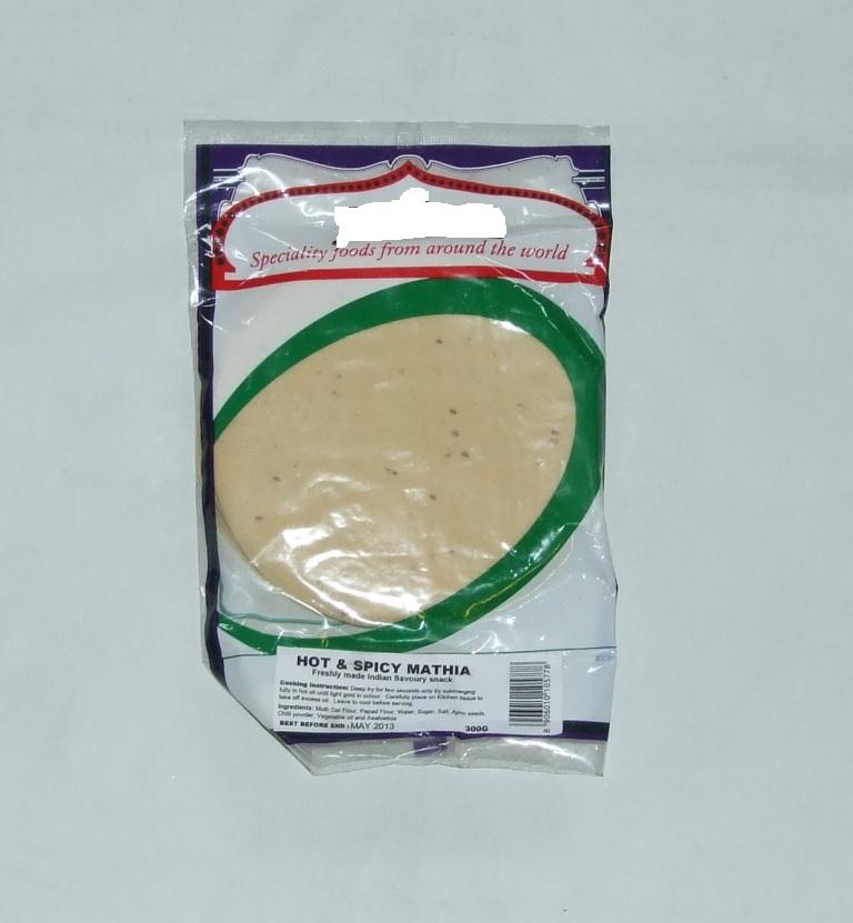 MATHIA PAPAD. DRIED ROUND PLAIN PAPPODUMS. TO BE FRIED IN HOT OIL BEFORE CONSUMPTION. INGREDIENTS INCLUDE: MUTH DAL FLOUR, VEGETABLE OIL, AJMO SEEDS AND CHILLI POWDER.