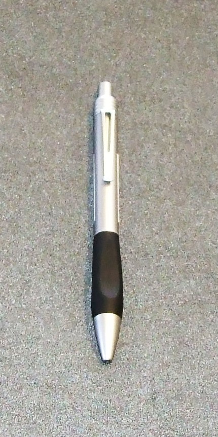 RETRACTABLE BALLPOINT PEN. WITH A SILVER AND BLACK BODY AND CLIP. INK COLOUR BLACK.