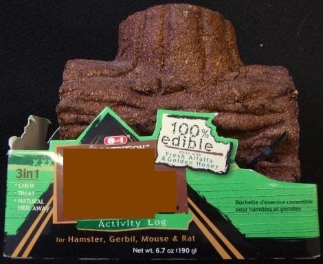 ANIMAL FEED PREPARATION IN THE SHAPE OF AN 100% EDIBLE LOG. SUITABLE FOR HAMSTERS, GERBILS AND MICE. DESIGNED FOR SMALL ANIMALS TO HIDEAWAY, PROVIDE A TREAT AND PROMOTE A NATURAL CHEWING INSTINCT. MADE FROM SAWDUST, MODIFIED STARCH, ALFALFA, ARTIFICIAL COLOURINGS, LIQUID MIX (WATER, GLYCERIN, SODIUM ALGINATAE, HONEY, PROPIONIC ACID, POTASSIUM SORBATE). DIMENSIONS APPROX 90MM HIGH 125MM LENGTH. WEIGHT 190G. PRESENTED ON PRINTED CARDBOARD PACKAGING.